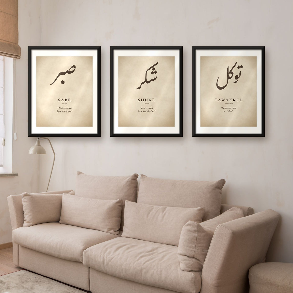Sabr Shukr Tawakkul Islamic wall art set of 3 in black frames above a beige sofa