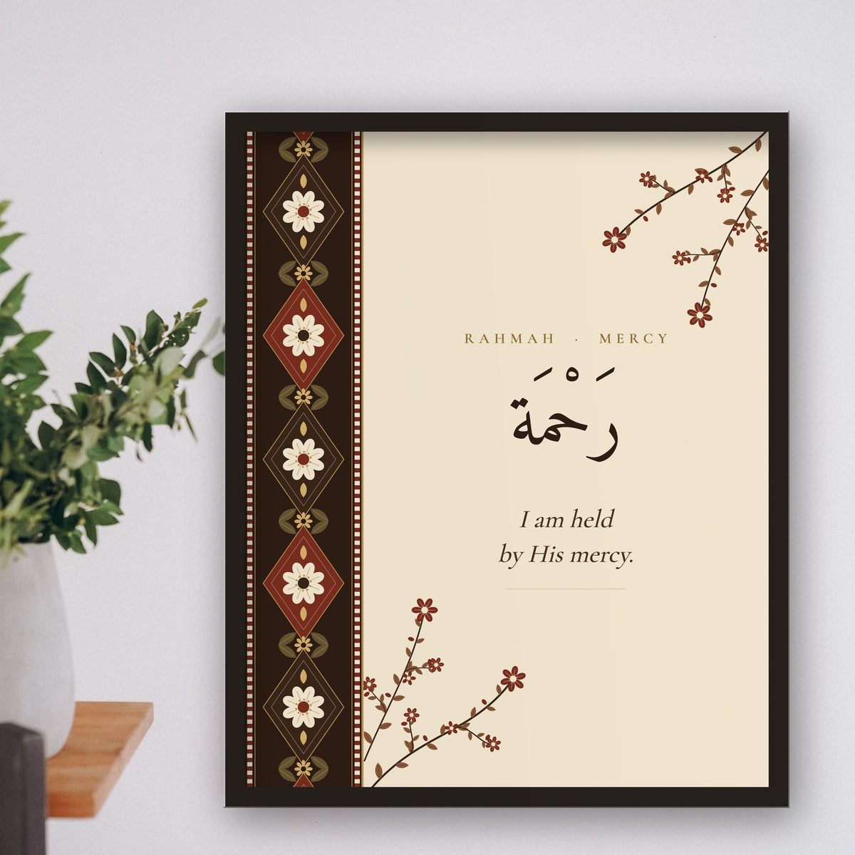 Rahmah Islamic affirmation wall art framed on a shelf wall with a plant